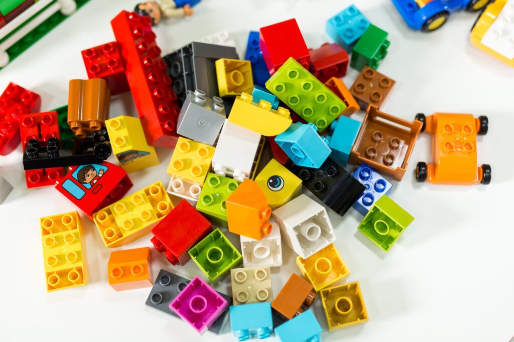 Plastic toy blocks on white background